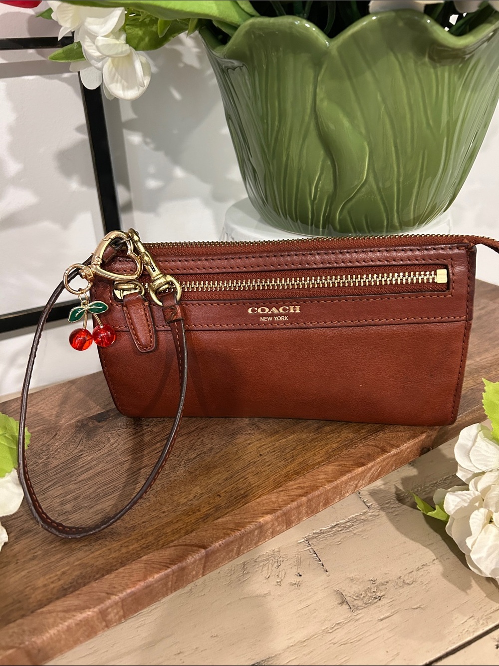 Coach Leather Wristlet in Chestnut with Cherry Charm